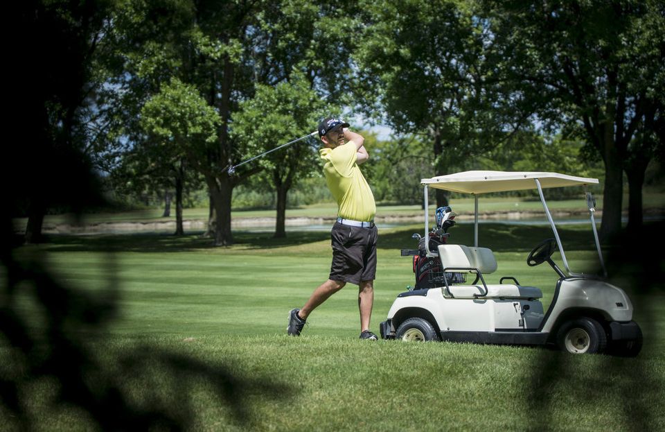 Jeremy Alarie drives from the rough 